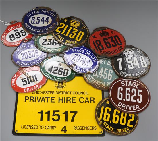 A collection of enamel Hackney taxi badges largest 21 x 15cm